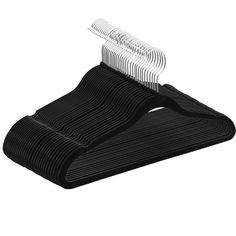 two black and white toothbrushes sitting on top of each other in front of a white background