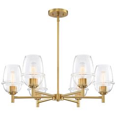 a brass chandelier with clear glass shades