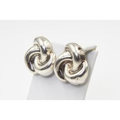 Pair of vintage Mexico Mexican knot design clip on earrings marked 925 Mexico Nestor TJ24. Silver Hallmarked Clip-on Earrings, Silver Hallmarked Clip-on Earrings For Formal Occasions, Vintage Clip-on White Gold Earrings, Vintage White Gold Clip-on Earrings, Elegant Stamped 925 Hoop Earrings For Formal Occasions, Elegant Formal Hoop Earrings Stamped 925, Vintage Mexico, Knot Design, Accessories Jewelry Earrings