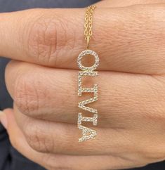 "This 14k personalized diamond name necklace is the perfect gift for the bridal party, someone special, or yourself. * All letters are capital. M A T E R I A L & L E N G T H Available in 14k Yellow Gold, 14k Rose Gold, 14k White Gold, Sterling Silver Thickness: 1.2mm / 0.05\" Initials Lowercase: 4 mm Capital: 8 mm Diamond: 0.10 ct. - 0.30 ct. depending on the name Color: G Quality: SI-VS Additional Notes: * Non-Conflict Diamonds * Made in the USA C U R R E N T ∙ T U R N A R O U N D Processin Luxury Personalized Custom Necklace For Personalized Gift, Luxury Personalized Custom Necklace For Gift, Personalized White Diamond Necklace, Elegant Personalized White Diamond Necklace, White Diamond Name Necklace For Gift, White Diamond Name Necklace As Gift, Diamond Name Necklace In White Gold, Diamond Name Necklace In White Gold For Gift, White Gold Diamond Name Necklace Gift