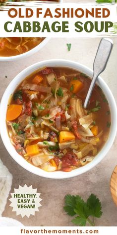 a bowl of old fashioned cabbage soup with carrots and parsley