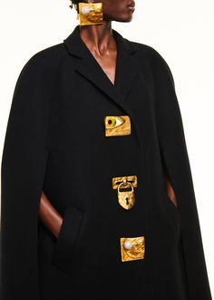 Get free shipping on Schiaparelli Padlock Cape at Bergdorf Goodman. Shop the latest luxury fashions from top designers. Elsa Schiaparelli, Berlin Fashion, How To Make Buttons, Mode Inspo, Looks Style, Fashion History, Moda Casual, Paris Fashion, Runway Fashion