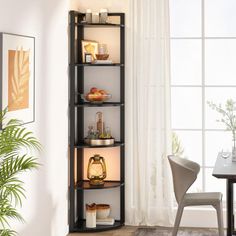 a room with a table, chairs and a book shelf in the corner next to a window