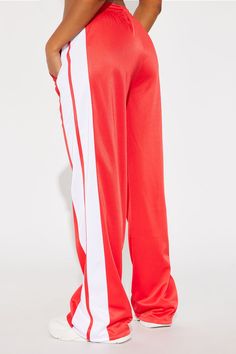 Available In Black Track Pant Low Rise Elastic Waistband Side Stripe Wide Leg Self: 100% Polyester Contrast: 100% Polyester Imported | Tinashe Track Pant in Red size 2X by Fashion Nova Aliyah Core, Core Outfits, Tracksuit Pants, Track Pant, Side Stripe, Red Fashion, Track Pants, Low Rise, Fashion Nova