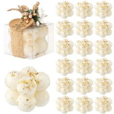 white chocolates are in a clear box with gold sprinkles