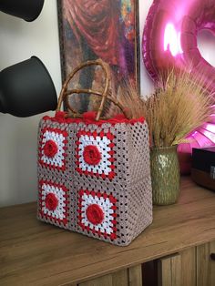 I hand make purse as a hobby, and I would love to start making them for people!  My purses are made with a great quality of  yarn 🧶 Purses size is approximately 12*12*6 If you have any other questions, please ask.  thanks for supporting my small business Trendy Woven Rectangular Crochet Bag, Trendy Square Natural Beach Bag, Trendy Rectangular Straw Bag As Gift, Trendy Rectangular Straw Bag For Gifts, Trendy Beige Crochet Bag For Gift, Trendy Rectangular Straw Bag For Gift, Red Rectangular Straw Bag For Daily Use, Casual Natural Crochet Bag As Gift, Beige Rectangular Beach Bag As A Gift