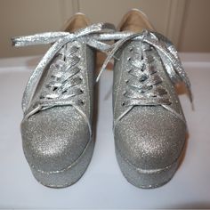 Liliana Size 8 Platform Glitter Shoes Womens Steppy-1 Silver Hologram Sneakers Condition: New Never Used Box Damage: Light Size: 7.5 M Closure: Lace Up Color: Silver (Subjective) Upper: Man Made Cushioning: Moderate Outsole: Man Made Pattern: Glitter Descriptive Words: Shiny, Unique, Casual, Glittery, Metallic Metallic Glitter Lace-up Sneakers, Sparkling Lace-up Synthetic Sneakers, Party Low-top Sneakers, Low-top Party Sneakers With Laces, Synthetic Heels With Glitter Accents And Round Toe, Party Sneakers Lace-up Synthetic, Party Platform Low-top Sneakers, Silver Synthetic Sneakers, Party Lace-up Synthetic Sneakers