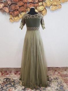 Olive Green Pearl Work Net Anarkali - Trendroots Traditional Semi-stitched Embellished Gown, Floor-length Gown With Dori Work For Diwali, Designer Bollywood Floor-length Embroidered Dress, Fitted Anarkali Gown With Intricate Embroidery, Anarkali Gown With Intricate Embroidery, Designer Bollywood Embroidered Floor-length Dress, Semi-stitched Embellished Embroidered Dress For Festivals, Embellished Semi-stitched Embroidered Dress For Festivals, Designer Anarkali Dress With Mirror Work