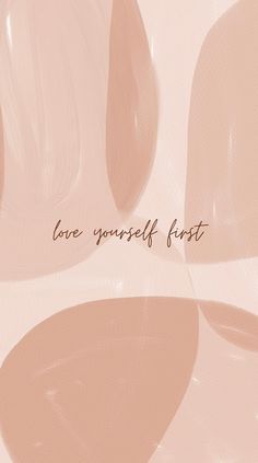 the words love yourself first are written in cursive font on a pink background