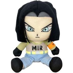 a stuffed toy with the word mr on it's chest and black hair, sitting down