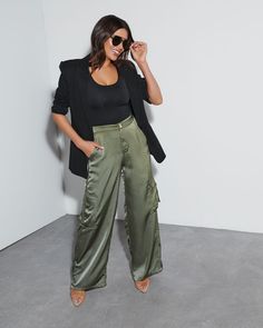 The Never Impossible Satin Cargo Pants combine the luxe look and feel of satin with the approachable, always-flattering cargo silhouette. It has a wide leg fit and pockets for anything you can think of. High rise Pocketed Wide pant leg Front zip fly & button closure 100% Polyester Silk Cargo Joggers Outfit, Outfits With Silk Pants, Olive Green Wide Leg Pants Outfit Work, Green Satin Cargo Pants Outfit, Straight Leg Utility Cargo Pants, Green Silk Pants Outfit, Black Satin Cargo Pants Outfit, Wide Leg Satin Pants Outfit, Silk Cargo Pants Outfit