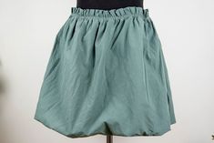 Vintage sage green mini skirt in mint condition. Seems handmade Shell feels cotton polyester blend Lining feels like cotton spandex blend Fits like women size M waist 34 cm = 13.4 inches hips open length 42 cm = 16.5 inches Green Mini Length Cotton Skort, Green Mini-length Cotton Skort, Green Mini Cotton Skort, Green Mini Length Cotton Bottoms, Green Mini-length Cotton Bottoms, Green Stretch Cotton Skort, Green Cotton Mini Skort, Green Mini Cotton Bottoms, Green Cotton Mini Bottoms