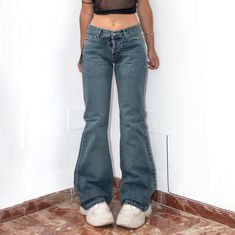 Y2k Deadstock Blue Acid Wash Mid Rise Jeans with tags . Thick material , 100% cotton. Size tag 38 so M , might suit for a M/L . The model is 1m63 and usually wears size S/M trousers . This one is big for her. Measurements are below in cm , for inch conversion please check the last picture. Waist 38cm  Hips 52cm Thighs 24.5cm Length 107cm Bottom Width 27cm Our policy : All items are authentic vintage pieces and are one offs; signs of wear and tear add to their authentic identity. No refund or exc Pants For Thick Thighs, Bell Bottoms Jeans, Wide Leg Denim Pants, Mid Rise Flare Jeans, Cowgirl Costume, Dream Jeans, Jeans For Women, Flared Jeans, Mid Rise Jeans