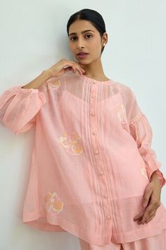 Pink sheer top featuring floral hand embroidery all over with drop shoulders and front button placket. Comes with an inner. - Aza Fashions Festive Spring Blouse Piece, Feminine Spring Tops With Chikankari Embroidery, Feminine Chikankari Embroidered Tops For Spring, Feminine Chikankari Embroidery Tops For Spring, Feminine Chikankari Tops For Spring, Festive Top With Blouson Long Sleeves, Festive Tops With Blouson Long Sleeves, Feminine Summer Festive Tops, Feminine Festive Summer Tops