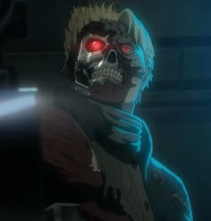 a man with red eyes and a skull on his face is standing in the dark