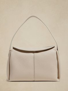 Vegan Leather Shoulder Bag | Banana Republic Factory Versatile Beige Leather Bag, Versatile Leather Pouch Shoulder Bag, Elegant Textured Leather Shoulder Bag For Travel, Elegant Textured Leather Travel Shoulder Bag, Faux Leather Pouch Shoulder Bag For Office, Elegant Soft Leather Shoulder Bag, Chic Daily Use Satchel With Smooth Grain, Chic Smooth Grain Satchel For Daily Use, Elegant Tote Shoulder Bag With Leather Lining