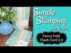 the simple stamping with connie card is displayed next to a blue vase and flowers