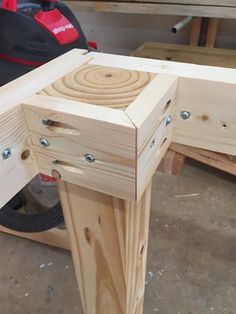 a work bench made out of plywood in a workshop with a circular sawing wheel