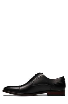 The Florsheim Sorrello Cap Toe Oxford features a modern, tapered toe, and rich burnished finish. Featuring breathable, full leather uppers, breathable suedetec linings, a fully cushioned footbed, and flexible rubber sole. Lace-up vamp Leather upper, rubber sole Imported Modern Fitted Leather Shoes For Business, Modern Fitted Leather Business Shoes, Modern Leather Derby Shoes With Plain Toe, Modern Leather Plain Toe Derby Shoes, Modern Black Fitted Oxfords, Modern Fitted Black Oxfords, Modern Fitted Cap Toe Dress Shoes, Fitted Leather Derby With Rubber Heel Cap, Liner Socks