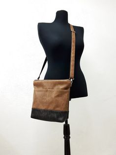 "Bag with five pockets! Crossbody leather bag in brown and black color. Original rustic pattern. It goes perfectly to every outfit. The bag is made of thick vegan / artificial / leather but at the same time soft and well structured. Black and brown leather with antique effect. Two outer pockets. Cotton lining with three internal pockets for better organization of the bag. Fastening with zipper. The long handle is lined with textile tape for better sliding around the body. Approximate sizes: Widt Thick Vegan, Rustic Pattern, Better Organization, Messenger Purse, Black Crossbody Purse, Vegan Leather Bag, Canvas Crossbody Bag, Vegan Bags, Black Crossbody