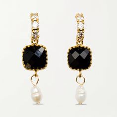 These are the earrings to wear to any party or celebration. Whether it's a gala or a birthday dinner, they are sure to elevate any outfit. Stack these earrings with sparkly studs, or wear them on their own. Composition White Freshwater Pearls Black Glass Gems 14k Gold Plated Brass About the Style Black and white pearl earrings with diamonds that are perfect for special occasions Black and white pearl earrings that can be dressed up or down Black and pearl earrings with diamonds that have a match White Pearl Earrings, Black Gems, Zodiac Bracelet, White Pearl Earring, Lock Necklace, Glass Gems, Birthday Dinner, Choker Style, Zodiac Necklaces