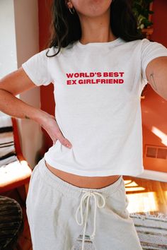 World's Best Ex Girlfriend Baby Tee, y2k Aesthetic Women's Tshirt. 90s's Baby Tee, y2k Clothing, Funny Shirt, Trendy Women's Fitted Tee PRODUCT SPECIFICATIONS: - 100% Cotton - Ethical and sustainable sourced materials - Double needle stitched collar, shoulders, armholes, cuffs & waistband. - Heavy Blend - This is the price for a single t-shirt AVAILABLE SIZES: - XS, S, M, L, XL (More sizes & colours available on request) DISCLAIMER: 👉 Colours may differ slightly due to the photograph or monitor Y2k Slogan T-shirt With Relaxed Fit, Y2k Relaxed Fit T-shirt With Funny Print, 90s Fitted T-shirt With Funny Text, 90s Inspired Fitted Tops With Letter Print, 90s Crew Neck Top With Relaxed Fit, Fitted 90s Inspired Tops With Letter Print, Y2k Fitted Tops With Funny Text, Fitted 90s Inspired Slogan T-shirt, Cute Unisex Tops With Funny Text