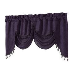 purple curtains with pom poms hanging on the top and bottom, in front of a white background