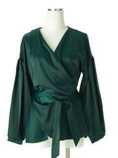 This is the dream top. This wrap top can typically be work in a few different ways and are usually tied to remain fastened. Made from high quality satin fabric. satin fabric- 100% high quality Polyester blend hand-wash unlined