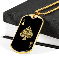 "This Ace of Spades Necklace Is the Perfect Gift Whether for Yourself or a Loved One. Explore all our Symbolic Jewelry here: https://www.etsy.com/in-en/shop/SymbolicPresent?ref=seller-platform-mcnav§ion_id=22069637 ➜ Our jewelry is made of high-quality surgical steel with a shatterproof liquid glass coating and an 18k gold finish option. ➜ Engrave onto the back of the Playing Card pendant your loved one's name, your wedding date, an anniversary, or anything else you want to remember and keep you Black Dog Tag Necklaces For Personalized Gift, Personalized Black Dog Tag Necklaces, Black Dog Tag Necklace For Personalized Gift, Personalized Black Dog Tag Necklace, Black Engraved Jewelry For Anniversary, Black Engraved Jewelry For Anniversary Gift, Customized Black Jewelry For Gifts, Black Necklace For Father's Day Anniversary, Black Engraved Necklaces For Anniversary