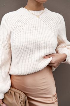 DETAILS   This knitwear sweater is the perfect blend of cozy comfort and versatile style. Featuring a classic round neckline and long sleeves, it's made from a soft knit fabric for a relaxed fit that will keep you warm all season long. With its playful feel and timeless design, this knitwear sweater is sure to become your go-to piece for any occasion!  round neckline  long sleeves  soft knit  relaxed fit  unlined  As seen on @fashionablysurfed    SIZING    model is 5' 6" and wears a Size S  mode Winter Outfits Petite, Soft Feminine Style, Modern Knitwear, Petal And Pup, Knitwear Outfit, Knitwear Sweater, Outfits Petite, Modern Feminine, Sweater Trends