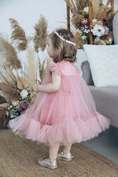 Celebrate your little girl’s first birthday in style with this charming blue tutu dress by Lily Couture. Featuring fluttery tulle sleeves and a flowing skirt, this dress is designed to add elegance and playfulness to any special occasion. The lightweight fabric ensures your baby’s comfort while creating a captivating silhouette. Available in 80 radiant colors, this versatile dress is perfect for birthdays, christenings, and memorable photoshoots that will last a lifetime. PLEASE NOTE: Most of th Dress With Tulle Sleeves, Blue Tutu Dress, Blue Tutu, Dress With Tulle, Baby Couture, First Birthday Outfit, Tulle Sleeves, First Birthday Outfits, Baby Portraits