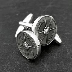 Here is a unique and high-quality description for the cufflinks:

Elevate your style with a touch of strength and sophistication. These exceptional Cufflinks Weight Plate Barbell Standard 45lbs from Wod & Fit Gym are the perfect gift for fitness enthusiasts, coaches, and weightlifters. Whether celebrating a milestone wedding, a coach's achievement, or a personal trainer's dedication, these unique Kettlebell Wod, Coach Gift Ideas, Engagement Presents, Vintage Baby Clothes, Bridesmaid Gift Boxes, Travel Jewelry Box, Mixed Metal Jewelry, Coach Gift