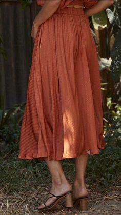 Even though this Woven Satin Long Midi Skirt is a pre-fall piece, it can be worn year round. This beautiful satin silk skirt has that perfect classic fit. Orange-color. Lined. Satin fabric. Side pockets. Full circle skirt. Woven Satin Long Midi Skirt fits true to size. By Together LA. **Skirt for sale only, top not available. Woven Satin Long Midi Skirt Measurements: Small measures 30" overall length. Medium measures 31" overall length. Large measures 32" overall length. 100% Poly, lining 100% R Midi Skirt Fits, Travel Skirt, Long Midi Skirt, Long Midi, Full Circle Skirt, Beach Skirt, Full Circle Skirts, Boho Skirts, Skirt Fits