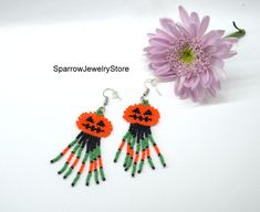 "Stylish earrings for Halloween, Seed bead pumpkin earrings These pumpkin earrings for Halloween are specially made for you to emphasize your style for the holiday. They emphasize your style and help you stand out from everyone else. This earrings is made from the high-quality Czech bead, with the use of sterling silver furnice, with a bright pumkin pattern. This pumpkin earrings can carry every girls and woman of any age, harmonizes with any clothes. Earrings details: Length: Dangle earrings me Beaded Dangle Earrings For Halloween, Dangle Beaded Earrings For Halloween, Adjustable Beaded Earrings For Halloween, Halloween Beaded Dangle Earrings Gift, Halloween Gift Beaded Dangle Earrings, Orange Dangle Earrings For Halloween, Beaded Pumpkin Earrings, Halloween Seed Bead, Bead Pumpkin