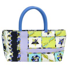 Snag this unique print Pucci bag for the upcoming poolside season. Emilio Pucci is known for his fluid shapes, kaleidoscopic motifs, and bright colors. This bag features a beautiful blue leather handle, intricate flower print with hues of lime green, purple, blue and black, and a spacious monogrammed interior. Think about pairing this with your favorite summer dress in your closet and some vintage Dior wedges. Length: 6in Width: 13in Depth: 3in Designer Blue Square Bags, Designer Bags With Floral Print For Spring, Designer Floral Print Bags For Spring, Luxury Floral Print Top Handle Bag, Luxury Multicolor Floral Print Bags, Designer Multicolor Floral Print Bags, Designer Bags With Floral Print For Shopping, Luxury Multicolor Shoulder Bag For Summer, Blue Rectangular Shoulder Bag With Rolled Handles