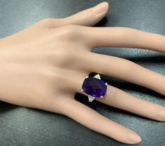 9.35 Carats Natural Impressive Amethyst and Diamond 14K Yellow Gold Ring Suggested Replacement Value $4,500.00 Total Amethyst Weight: Approx. 9.00 Carats Amethyst Measures: Approx. 16 x 12mm Natural Round Diamonds Weight: 0.35 Carats (color G-H / Clarity SI1-SI2) Ring total weight: 7.2 grams Disclaimer: all weights, measurements and colors are approximate and may vary slightly from the listed dimensions or as seen in the image. All pictures are magnified to show the smallest of details. Please, Luxury Cushion Cut Amethyst Ring For Anniversary, Luxury Cushion Cut Amethyst Ring For Formal Occasions, Luxury Amethyst Cushion Cut Ring For Formal Occasions, Luxury Amethyst Cushion Cut Ring For Formal Events, Formal Amethyst Cushion Cut Ring With Accent Stones, Cushion Cut Amethyst Ring For Formal Occasions, Luxury Formal Amethyst Gemstones, Luxury Cushion Cut Amethyst Ring For Gift, Emerald Cut Aquamarine Ring