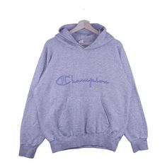 This vintage hoodie is a must-have for any fashion enthusiast. It features a classic 80s cut and a grey color that will never go out of style. The Champion spell-out in front adds a unique touch to the piece, making it stand out from the crowd. Champion is a renowned American sportswear brand that has been around since 1919, and this hoodie is a perfect way to show your appreciation for the brand. With its timeless design, this hoodie is sure to become a staple in your wardrobe. Grey 80s Hoodie 80s Hoodie, Vintage Hoodie, Fashion Enthusiast, Best Comments, Vintage Hoodies, Champion Hoodie, Sportswear Brand, Grey Color, Grey Hoodie