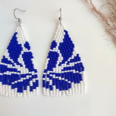 White and Blue Pattern Boho Beaded Fringe Earrings, Ombre Long Chandelier Dangle Earrings, Hippie Bohemian Dangling Statement Jewelry - Etsy Bohemian Blue Long Drop Beaded Earrings, Blue Beaded Dangling Earrings For Festivals, Blue Beaded Earrings With Dangling Beads For Festival, Blue Dangling Beads Earrings For Festival, Blue Bohemian Beaded Dangle Earrings, Blue Bohemian Beaded Earrings For Pierced Ears, Traditional Blue Beaded Earrings With Tiny Beads, Blue Tiny Beads Earrings For Festivals, Bohemian Blue Chandelier Earrings As Gift