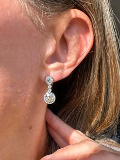 For Sale on 1stDibs - These dazzling Art Deco diamond drops highlight a sizable matched pair of sunshiny European-cut diamonds, together weighing 3.47 carats, swing and sway Gia Certified Pear-shaped Diamond Earrings, Classic Pear-shaped Diamond Earrings With Single Cut, Classic Platinum Pear-shaped Diamond Earrings, Classic Platinum Diamond Earrings With Single Cut Diamonds, Classic Platinum Dangle Diamond Earrings, Platinum Drop Diamond Earrings For Anniversary, Platinum Diamond Drop Earrings For Anniversary, Classic Dangle Diamond Earrings With Single Cut, Classic Dangle Diamond Earrings With Single Cut Diamonds