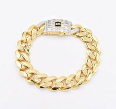 "15mm Miami Cuban Royal Link Plain Baguette Lock Bracelet Real 10K Yellow Gold * Metal : Real 10K Yellow Gold (Properly Stamped, 10K) * Condition : Brand New * Finish : Polished * Avg Weight : 25.60 grams for 9\" * Width : Selectable * Clasp/Bail : Baguette Box Clasp All of our items are brand new and are shipped with a gift box." Plain Bracelet, Ear Piercing Studs, Lock Bracelet, Ear Piercings Tragus, Bracelet Box, Miami Cuban, Box Clasp, Everyday Necklace, Necklace Box