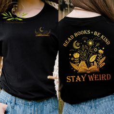 Read Books Be Kind Stay Weird Shirt, Whimsigoth Bookish Shirt, Book Lover Shirt, Bookish Shirt, Gift For Reader, Teacher Shirt, Bookworm, Book Lover Boho Gift, Gift For Her, Trendy Shirt. Hi there! Thank you so much for visiting our shop and checking out our finest t-shirt designs. In order to provide you best service, we are using the quality materials and beautiful designs.  * Note - We have t-shirts, sweatshirts, and hoodies in a listing. - Please check size chart before order to ensure you r Black Bookish T-shirt With Screen Print, Black Bookish Top With Letter Print, Black Letter Print Top For Bookish Style, Literary Black Cotton T-shirt, Black Literary Top With Graphic Print, Black Literary Crew Neck T-shirt, Black Literary T-shirt With Letter Print, Stay Weird, Weird Shirts