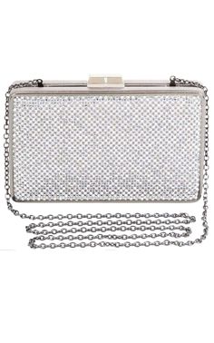 Glistening metal mesh and tonal hardware trim create a high-shine finish to this night-out clutch. Pair it with cocktail dresses for after-hours.Removable chain shoulder strap.Top clasp closure.Materials: Glass stones in metal mesh, acetate, cotton, polyester.Lining: Rayon. Glamorous Silver Evening Bag With Chain, Silver Evening Bag With Chain, Silver Evening Bag With Chain Strap For Events, Silver Evening Bag With Chain For Party, Rectangular Clutch With Chain Strap For Night Out, Silver Chain Evening Bag For Party, Chain Clutch Evening Bag For Night Out, Silver Rhinestone Clutch For Night Out, Silver Clutch With Chain For Party