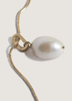 The Pearl Collection. Known as the "Queen of Gems," pearls stand for wealth, power, and wisdom. Baroque pearls are naturally formed in the mollusk, and their finite beauty is derived from the asymmetric silhouettes—which makes each pearl unique. Already have a chain? To purchase the pearl individually, visit HERE. Please note that pearls are organic gemstones, so they're vulnerable to acid, extreme humidity and are not meant to be worn in the shower. One-Of-A-Kind: All stones are 100% natural, m Yellow Gold Baroque Pearl Necklace With Pearl Charm, Timeless Pearl Necklace With Pearl Chain, Timeless Pearl Chain Necklace, Elegant Baroque Pearl Chain Necklace As Gift, Elegant Baroque Pearl Chain Necklace Gift, Delicate Baroque Pearl Necklace In Yellow Gold, Timeless Pearl Necklace With Pearl Charm, Yellow Gold Necklaces With Baroque Pearl Pendant, Refined Gold Pearl Necklace With Charm