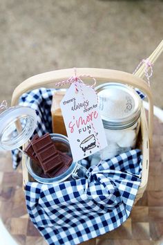 a basket filled with lots of different types of items on top of a wooden table