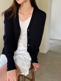 Lightweight summer v-neck cardigan. Button through front and slim fit. Soft and cozy texture. Natural silky, luxurious material. Model is in MINUSEY ONE SIZE. ✔️ Free worldwide express shipping over $100✔️ Loved by 6,500+ customers✔️ Limited edition collections, maximum style⠀⠀⠀⠀⠀⠀⠀⠀⠀Stay ahead of the trend with can’t-find-anywhere-else staples. Your closet will thank you 💕* MINUSEY ONE SIZE = EU 34-38, US 2-6* 35% Silk / 20% Wool / 45% Nylon* Dry clean* Made in Korea - Model Height: 172cm/5'7" (US2, EU34) Versatile V-neck Cardigan For Layering, Elegant Black V-neck Sweater For Work, Solid Color V-neck Cardigan For Everyday, Versatile V-neck Cardigan With Button Closure, Trendy V-neck Cardigan For Daywear, Spring V-neck Sweater With Buttons For Work, Solid V-neck Cardigan For Layering, Versatile Everyday Cardigan With Button Closure, Classic V-neck Cardigan With Buttons