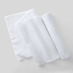 two white towels folded on top of each other