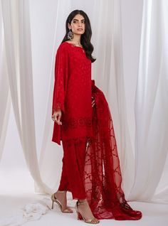 Stand out in this elegant outfit, meticulously crafted from a remarkably glamourous shade of red with its intricate hand-crafted details, with intricate embroidery on the dupatta intertwines with the fabric, forming floral motifs strikes the perfect balance between elegant and eye-catching, making this beautiful design a must have. Shirt: Self JacquardPants: Self JacquardDupatta: Organza Red Embroidered Party Wear Dresses, Unstitched Red Georgette Salwar Kameez, Red Embroidered Salwar Kameez For Formal Occasions, Formal Red Salwar Kameez With Intricate Embroidery, Formal Red Embroidered Salwar Kameez, Red Party Wear Dupatta With Intricate Embroidery, Red Lawn Suit With Dabka For Wedding, Red Embroidered Party Wear Traditional Dress, Red Embroidered Traditional Party Wear