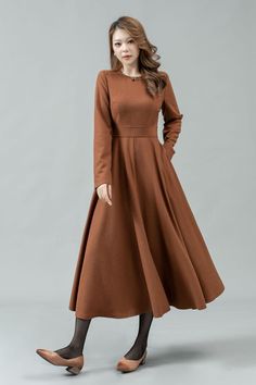 ★★ Welcome to my Ylistyle's shop！！！ This long camel fit and flare wool dress can well show your elegant temperament and taste. Our midi long sleeve wool dress, made of high-quality fabric, giving you a good touch and very comfortable to wear. ★★FEATURES 25% wool, other fiber,nylon Polyester lining Two side pockets Back zipper closure Long sleeves dress Long wool dress Fit and flare dress Dress formal Autumn winter wool dress Dry clean Belt not for sale ★★ More color from Color4 of Wool fabric swatch https://etsy.me/37PMzfD ★★ The model's height approx 170 cm (5′ 7″) with the 84 cm (33") bust, 66 cm (26") waist. She is wearing the wool dress in size XS (US2) ★★Bespoke Order Service Request other color Request the Length Request the sleeve length Your height is not between 155cm- 175cm Your Winter A-line Solid Color Maxi Dress, Beige A-line Maxi Dress For Fall, Casual Winter A-line Maxi Dress, Beige A-line Winter Dress, Beige A-line Dress For Winter, A-line Midi Dress For Winter, Solid A-line Midi Dress For Fall, Solid Color A-line Midi Dress For Fall, Winter Beige A-line Dresses