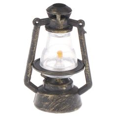 an old fashioned lantern with a candle in it's center on a white background