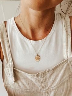 The Heirloom Necklace is a timeless beauty that makes a minimal yet elegant statement.14 Karat Gold Filled, Non-Tarnish, Hypoallergenic 16, 18, and 20 inch chain options.Oval measures 22 x 15 mm.Can be left as is or a single letter can be added to the center. Gold Tag Necklace, Heirloom Necklace, Mama Necklace, Athens Ga, High Hopes, Gold Bar Necklace, Single Letter, Face Light, Tag Necklace